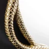 Dekorativer Spiegel SNAKE L 50cm gold Metall Schlangen-Skulptur