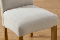 Design Stuhl CASA beige Leinen Massivholzbeine mit Zierknöpfen und Nackenrolle