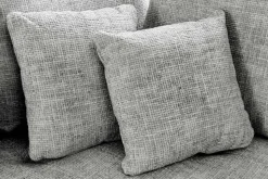 Moderne Wohnlandschaft KENT 220cm grau Strickstoff Ecksofa inkl. Hocker und Kissen